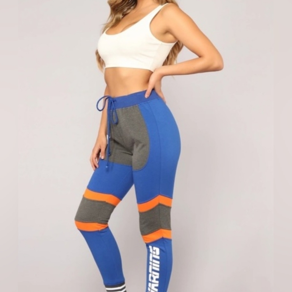 Blue and Gray Athletic Leggings with Orange Accents